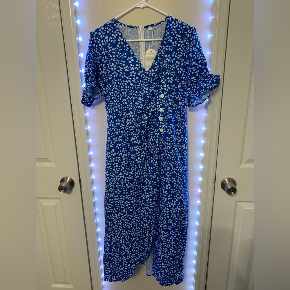 NWT in the bag Soft Floral dress- open slit with skirt underneath